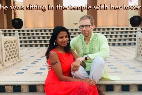 She was sitting in the temple with her lover